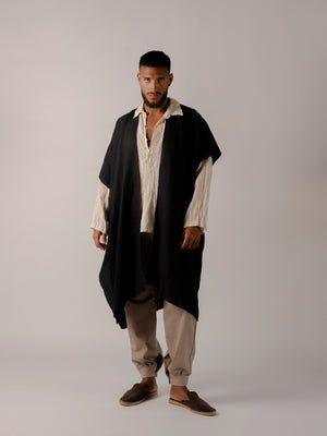 Men's linen cape cover up with relaxed minimalist silhouette.
