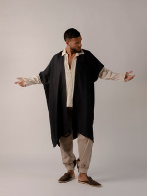 Lightweight linen cape for men crafted from breathable natural fabric.