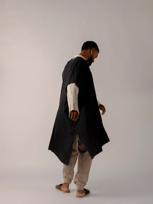 Lightweight linen cape for men crafted from breathable natural fabric.