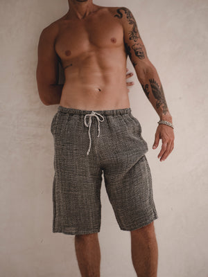 Man wearing the PORTOFINO Italian textured linen shorts.