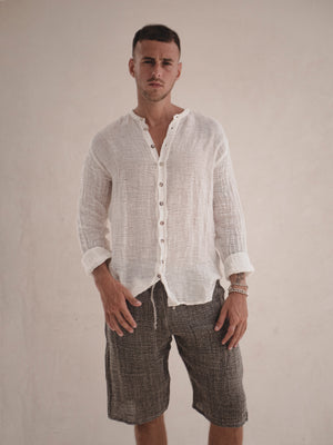 Relaxed Italian linen shorts designed for warm-weather dressing.