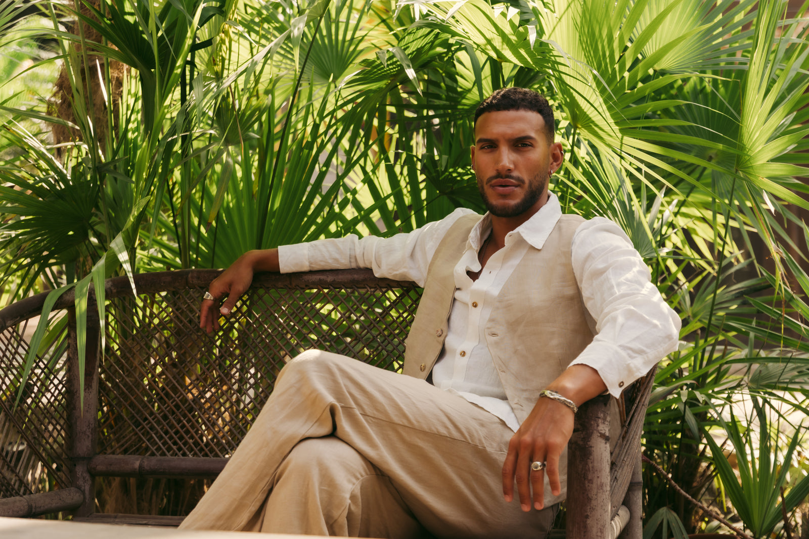man wearing a linen set in the jungle