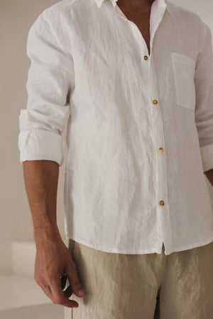 Man wearing the MILANO classic men's white linen shirt.