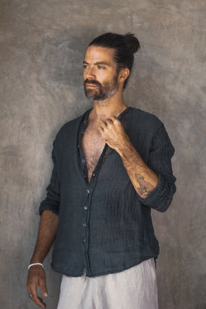Relaxed men's collarless shirt made from textured Italian raw linen.