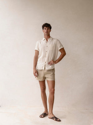 White classic short sleeve linen button-down shirt for men.