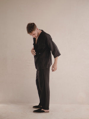 Black men's short linen kimono cover up with relaxed fit and minimalist design.