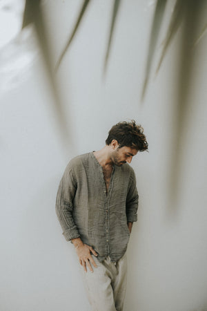 Collarless neckline on a handcrafted Italian raw linen shirt.